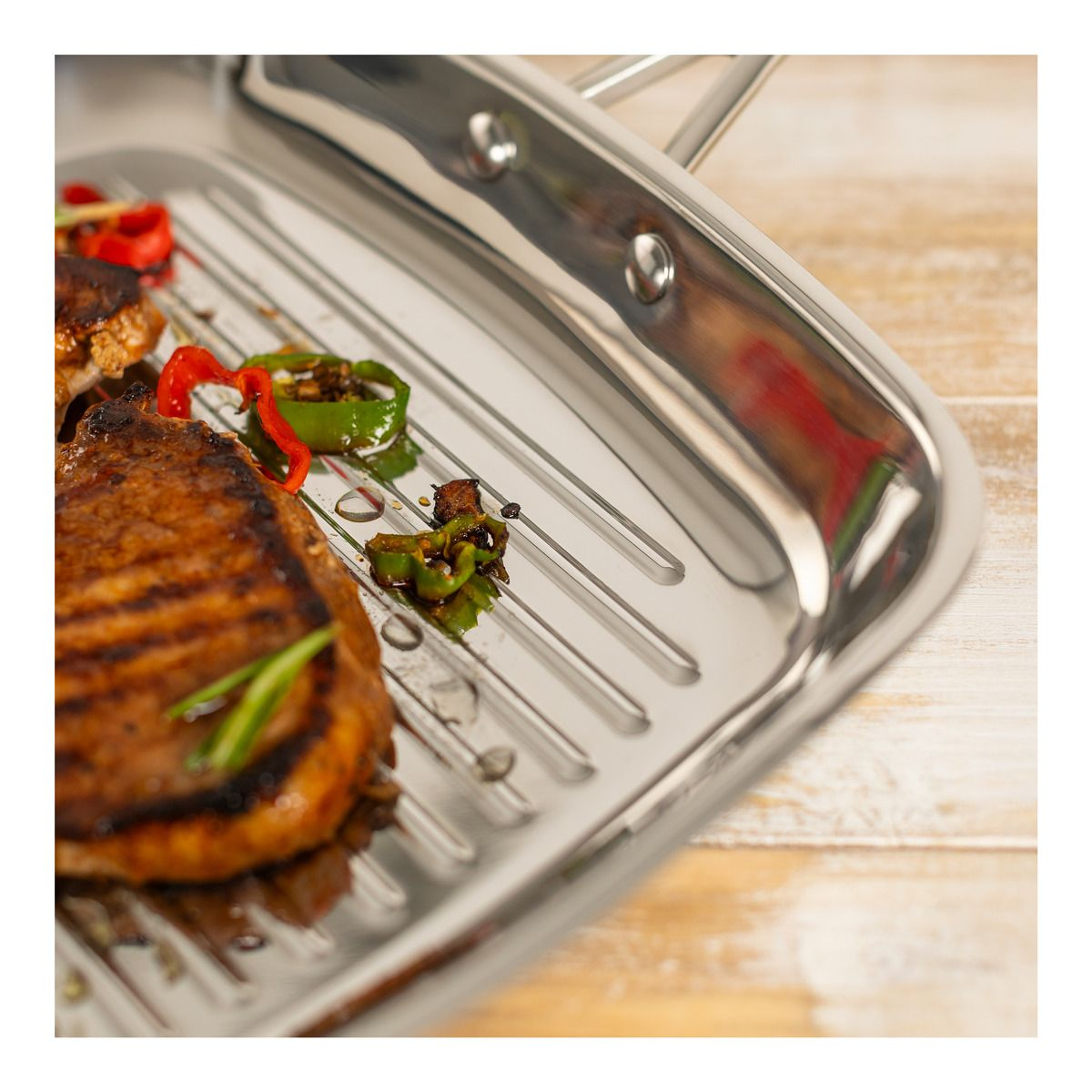 Kuhn Rikon Allround Grillpfanne unbeschichtet gerillt Ø27x27cm1